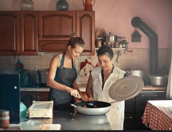 Mother and daughter cooking