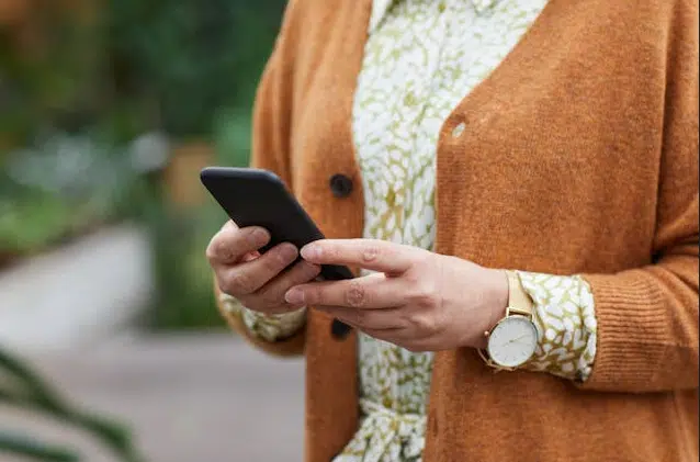 Woman looking at cell phone